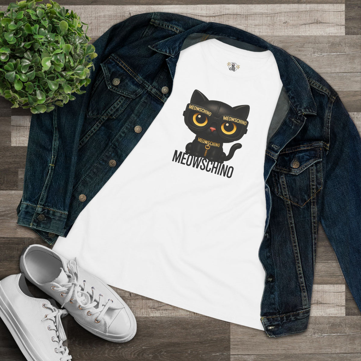 Meowschino Black Leather Cat Graphic Women's T-Shirt in white, flat lay
