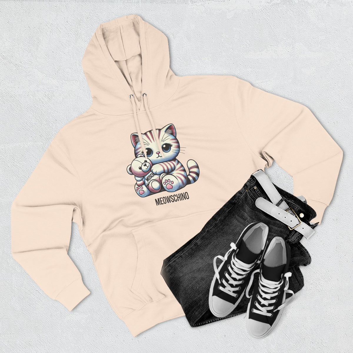 Meowschino Teddy Hug Cat Graphic Hoodie in pale pink, flat lay