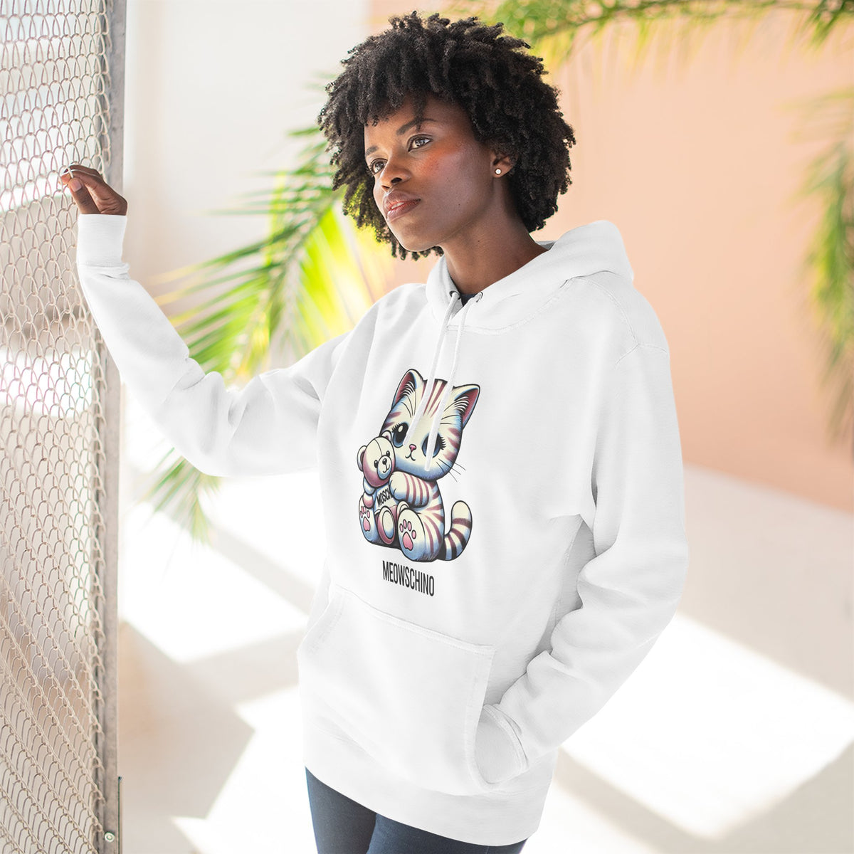 Meowschino Teddy Hug Cat Graphic Hoodie in white, worn by a female model