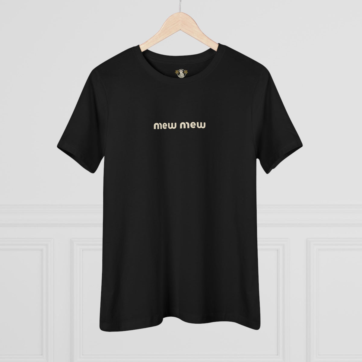 Mew Mew Chest Logo Back Cat Graphic Women's T-Shirt in black, on a hanger