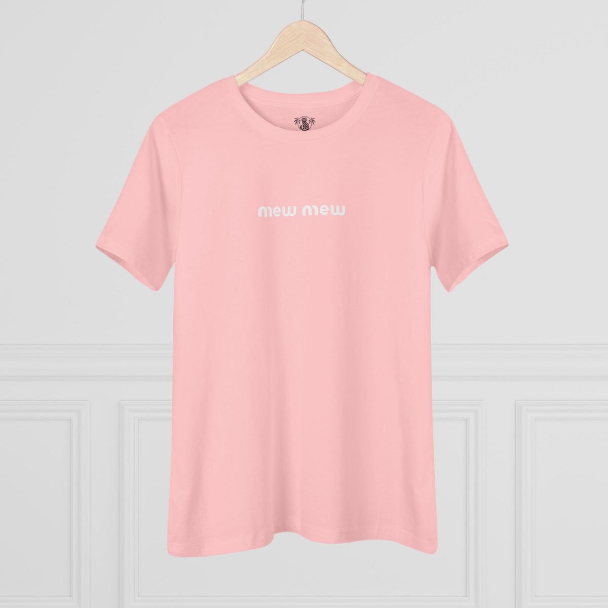 Mew Mew Chest Logo Back Cat Graphic Women's T-Shirt in pink, on a hanger