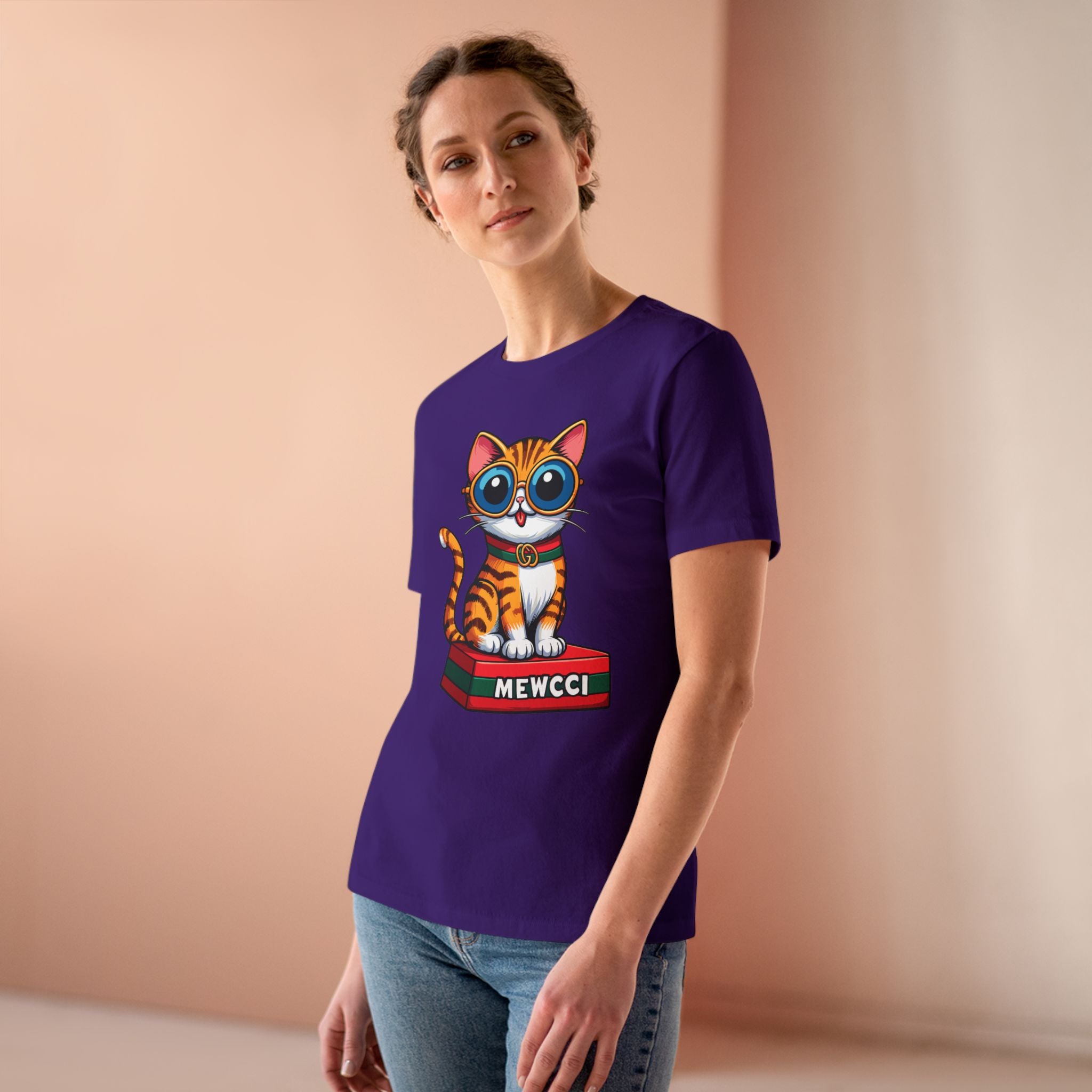 Mewcci Iconic Box Cat Graphic Women's T-Shirt in team purple, worn by a female model