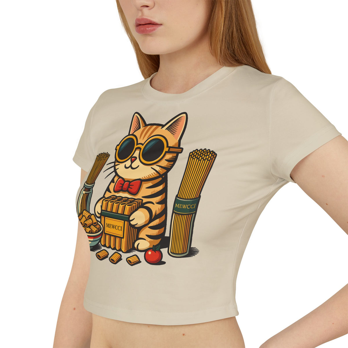 Mewcci Pasta Chef Cat Graphic Women's Baby Tee in sand, worn by a model
