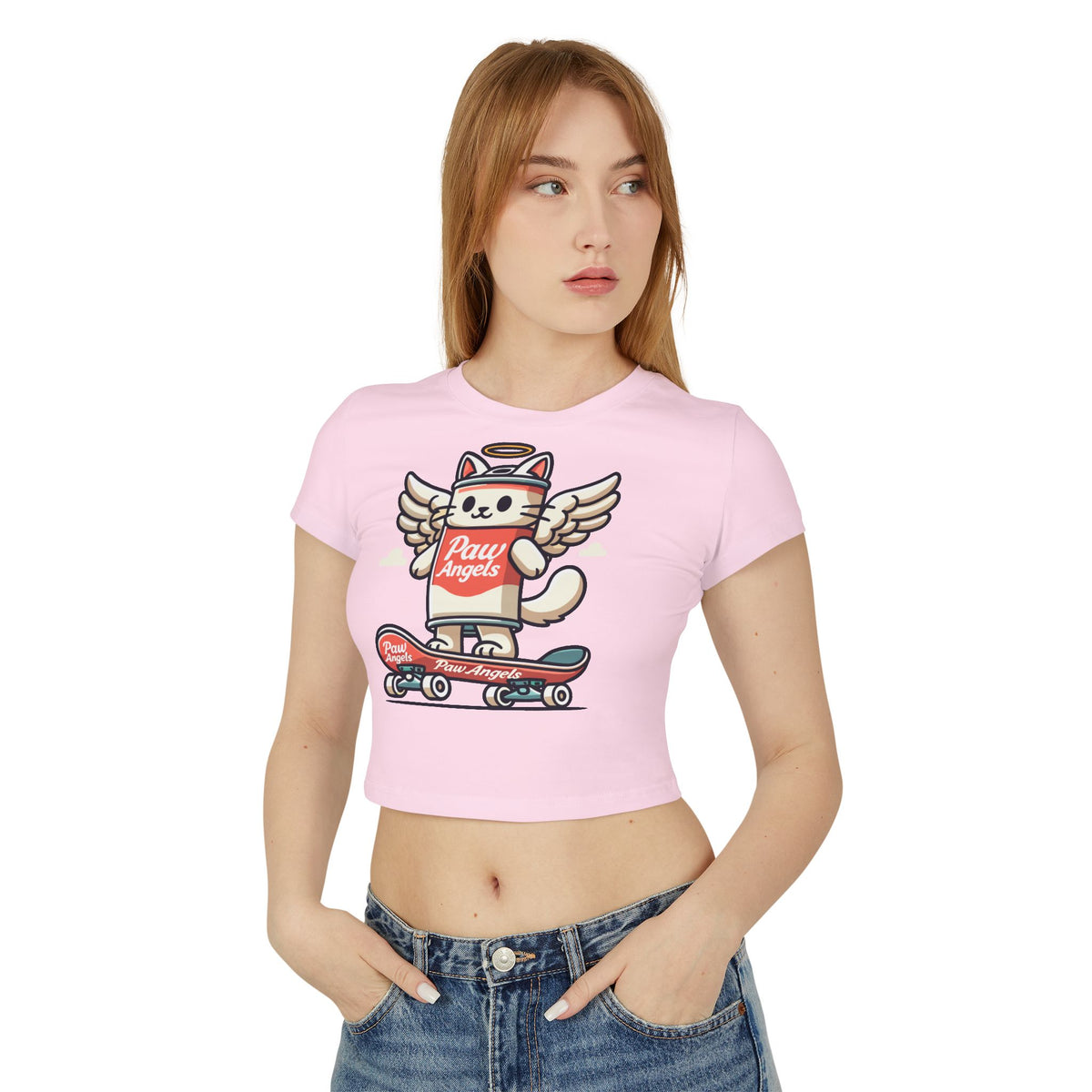 Paw Angels Spray Cat Graphic Women's Baby Tee in light pink, worn by a female model