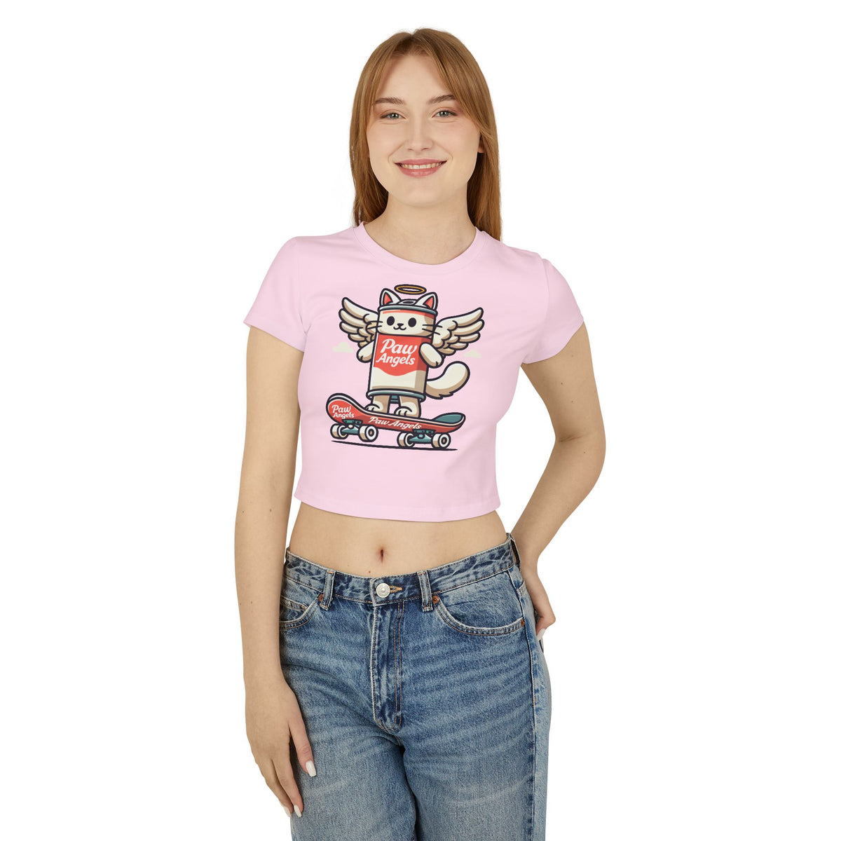 Paw Angels Spray Cat Graphic Women's Baby Tee in light pink, worn by a female model