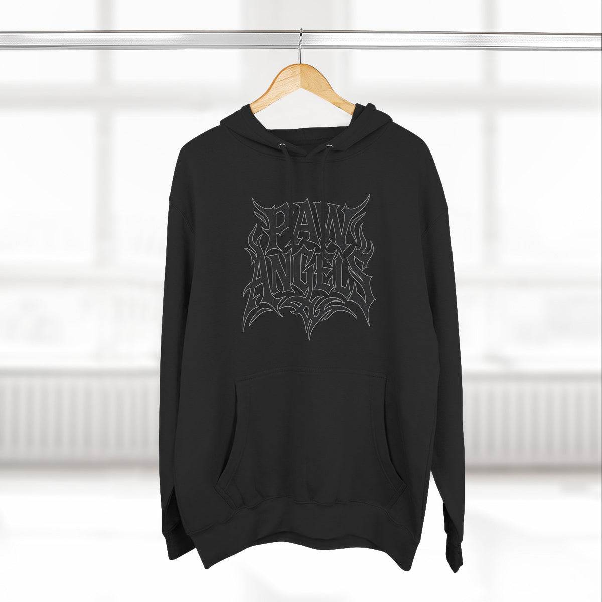 Paw Angels Tribal Logo Graphic Hoodie in black, on a hanger