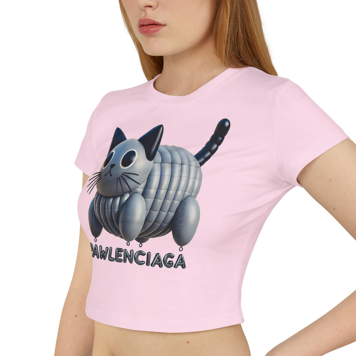 Pawlenciaga Cat Balloon Graphic Women's Baby Tee in light pink, worn by a model