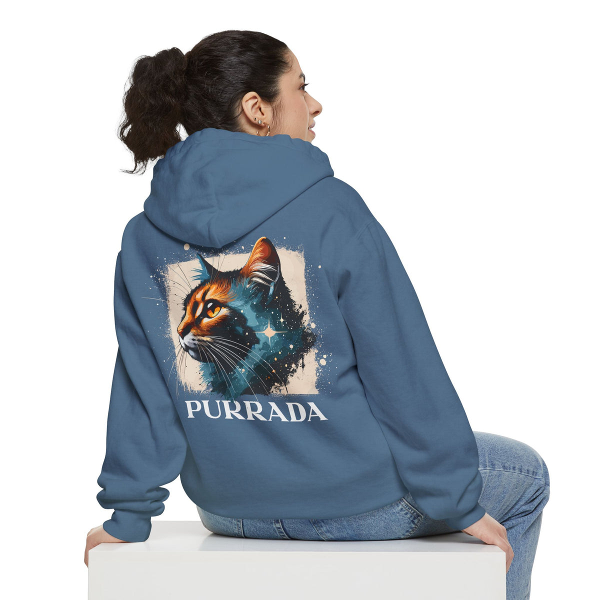 Purrada Chest Logo Cosmic Gaze Cat Graphic Hoodie in blue jean, back view on a female model
