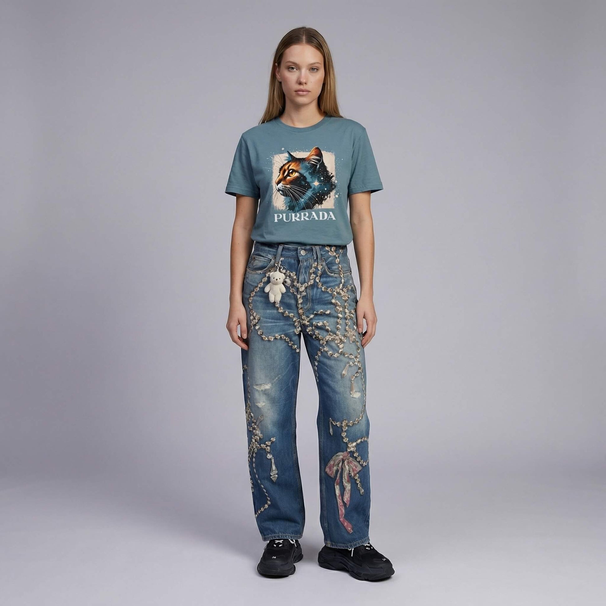 Purrada Cosmic Gaze graphic cat shirt by Mad Cat Cartel in slate blue worn by woman model