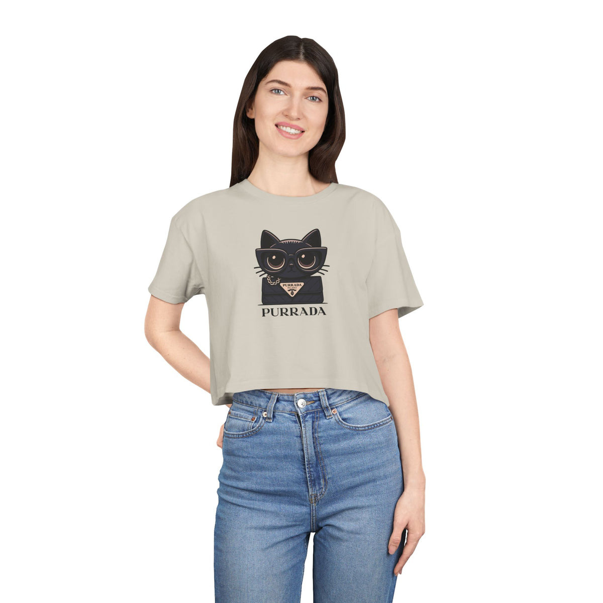 Purrada Noir Bag Cat Graphic Women's Crop Tee in bone, worn by a female model
