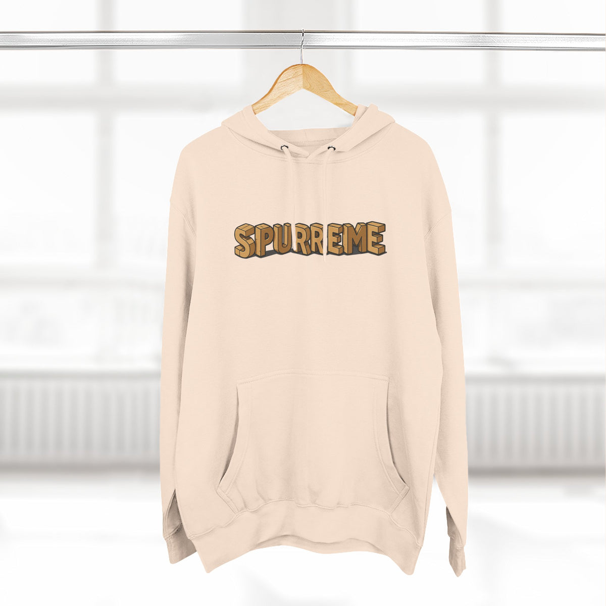 Spurreme Box Addict Cat Graphic Hoodie in pale pink, on a hanger