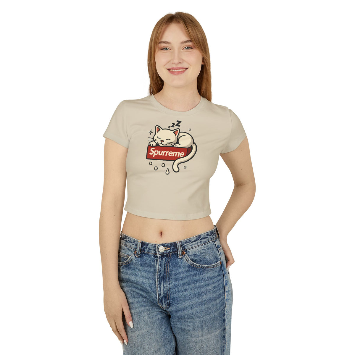 Spurreme Box Logo Dreaming Cat Graphic Women's Baby Tee in sand, worn by a female model