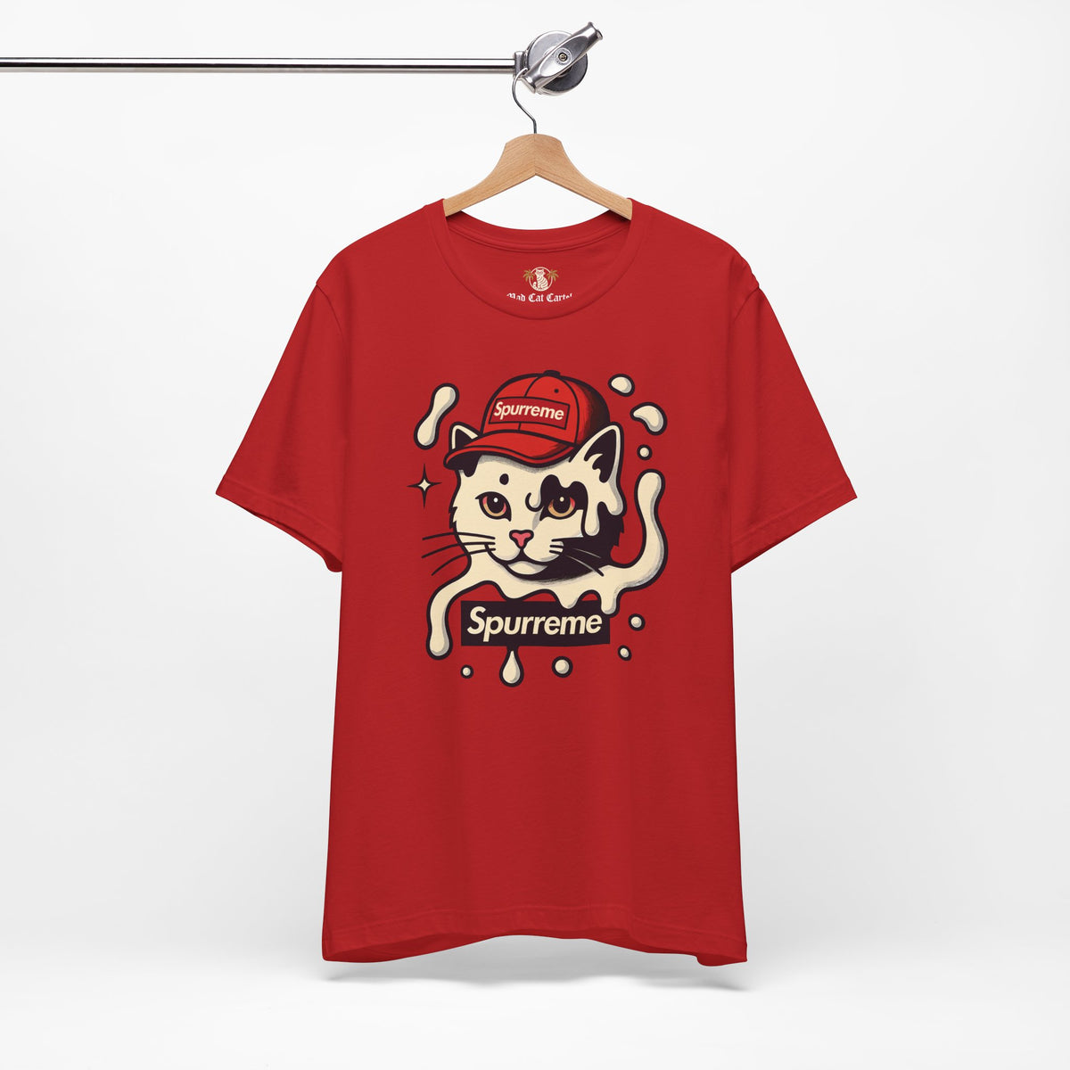 Spurreme Cream Cap Cat Graphic T-Shirt in red, on a hanger
