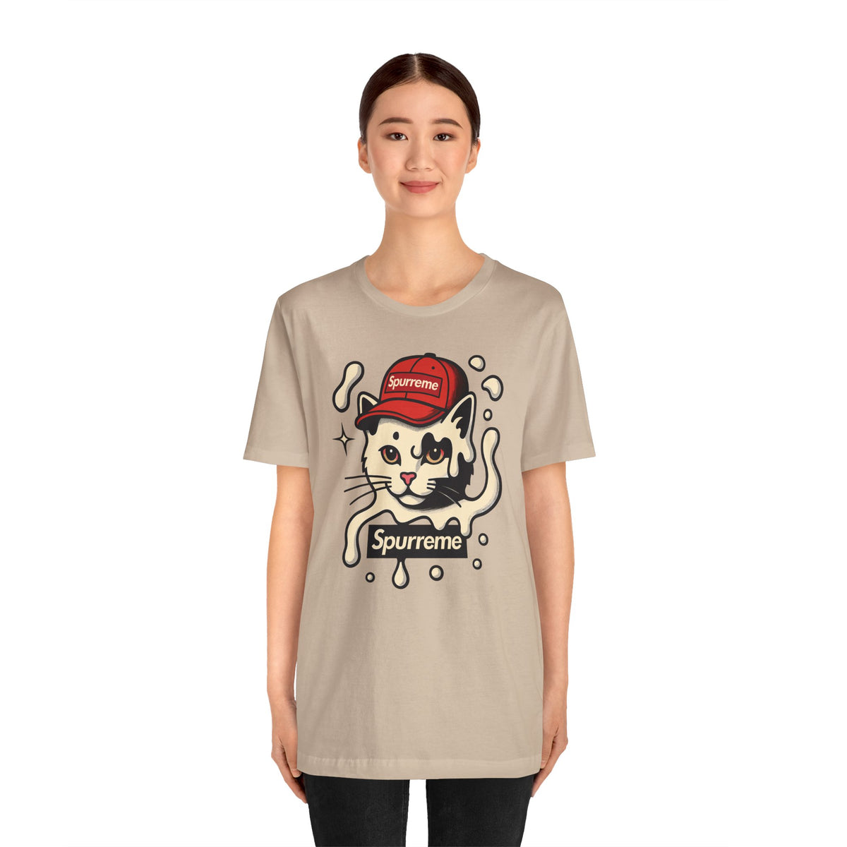 Spurreme Cream Cap Cat Graphic T-Shirt in tan, worn by a female model