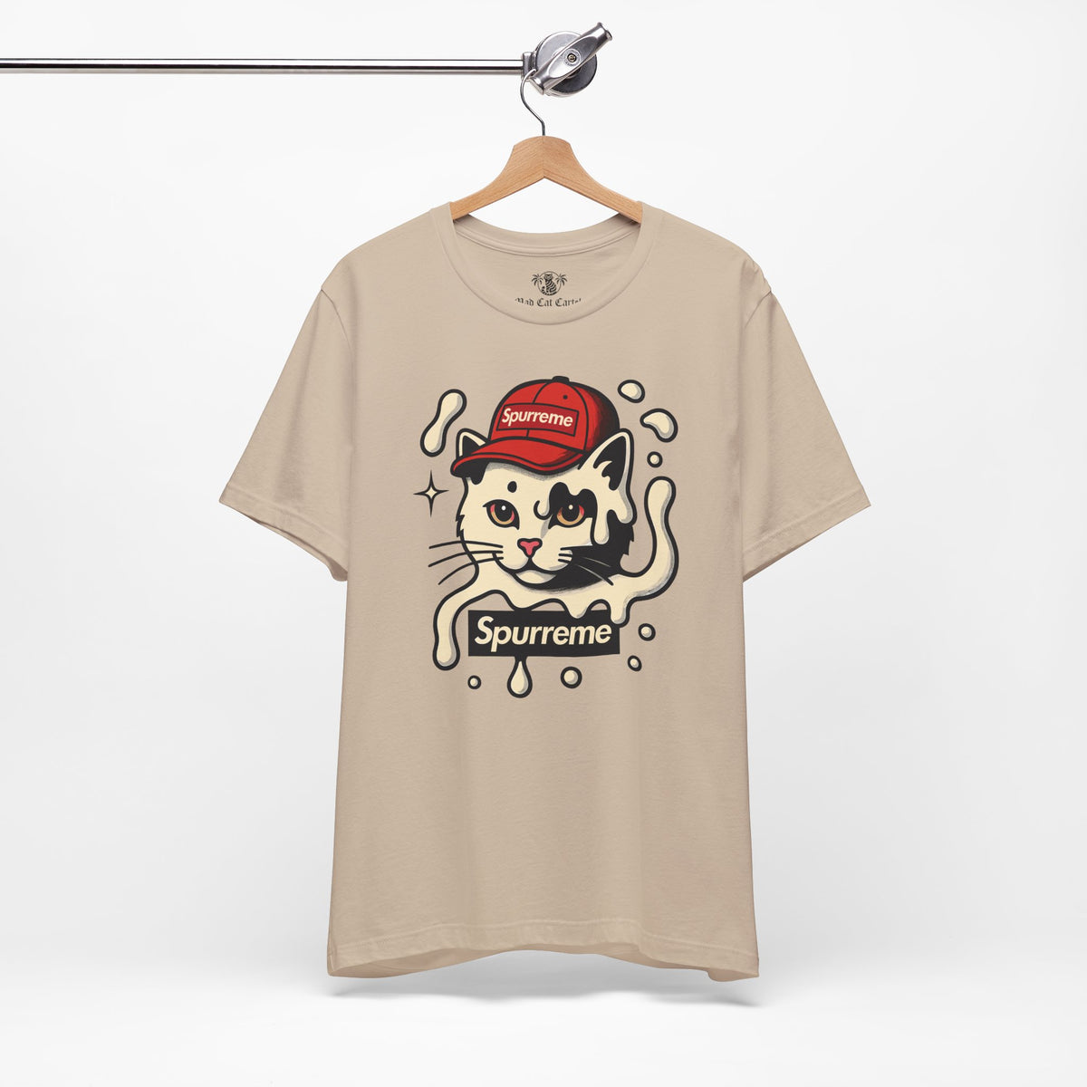 Spurreme Cream Cap Cat Graphic T-Shirt in tan, on a hanger
