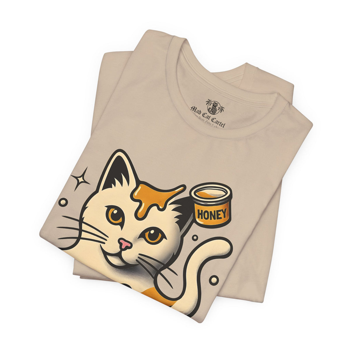 Spurreme Drip Drop Honey Meowgnum Cat Graphic T-Shirt in tan, folded