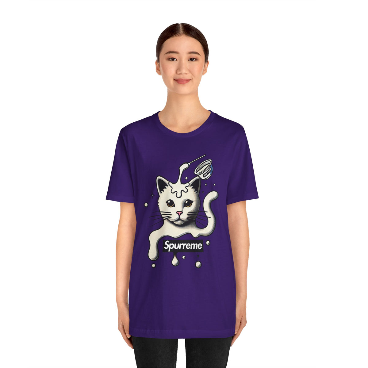 Spurreme Milky Mischief Cat Graphic T-Shirt in team purple, worn by a female model