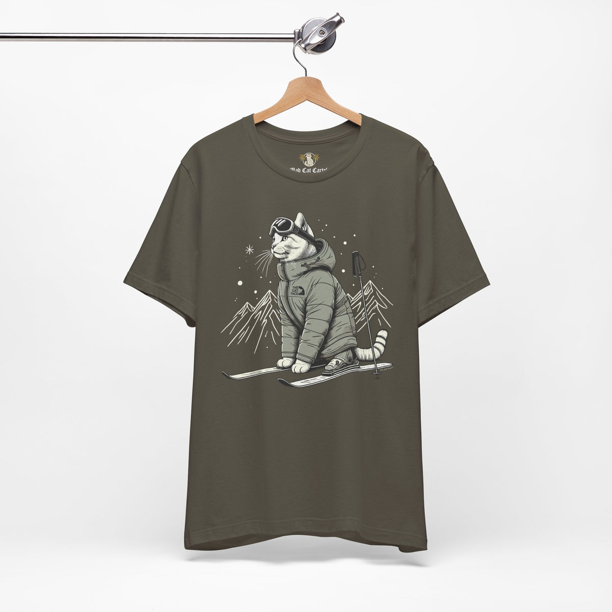 The Cat Face Alpine Explorer Graphic T-Shirt in army, on a hanger