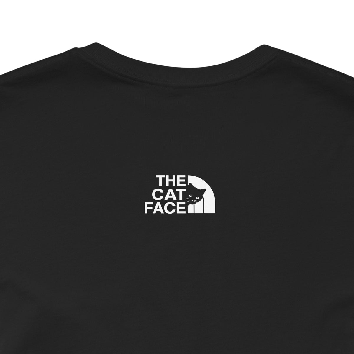 The Cat Face Alpine Explorer Graphic T-Shirt in black, close-up of the back print