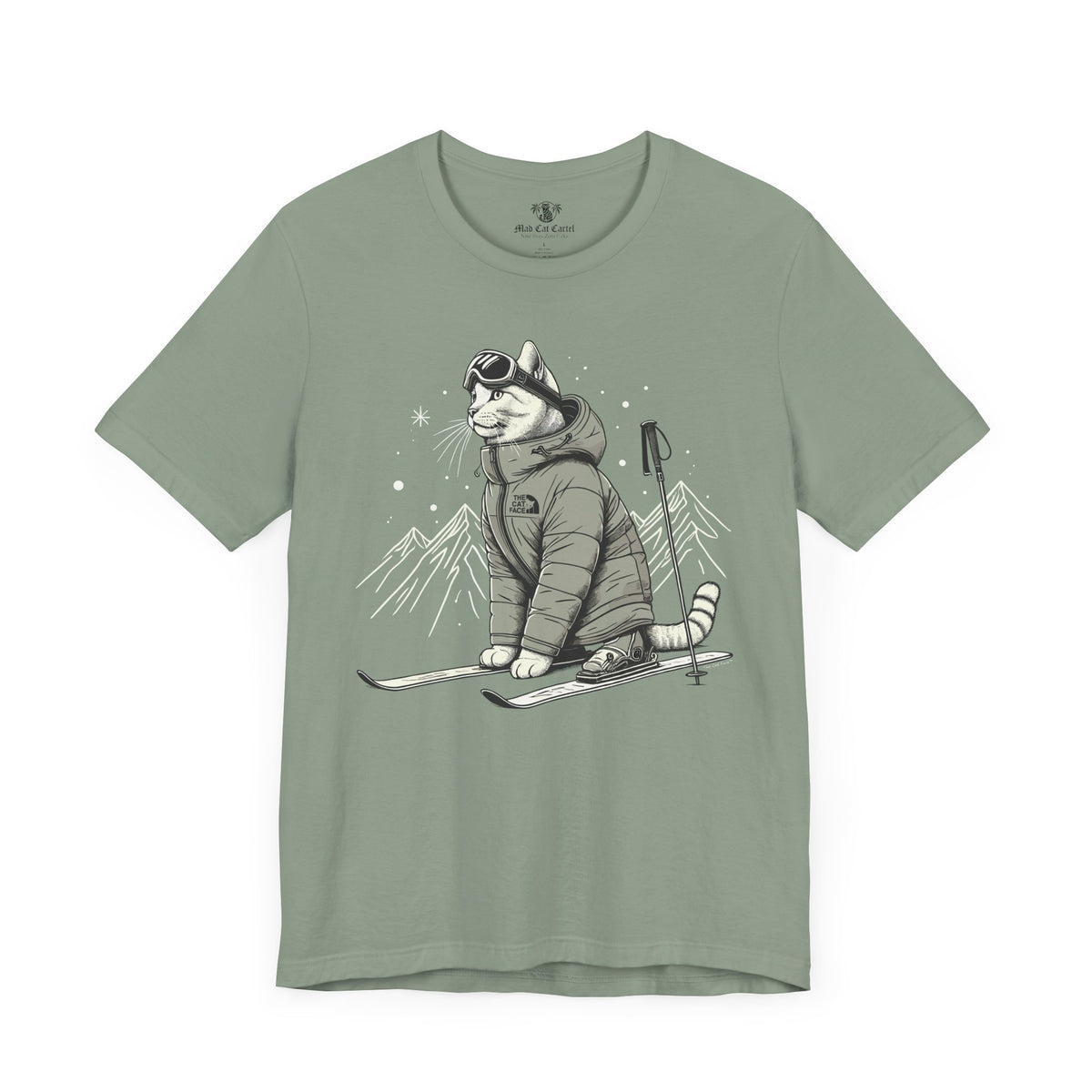 The Cat Face Alpine Explorer Graphic T-Shirt in sage, flat lay