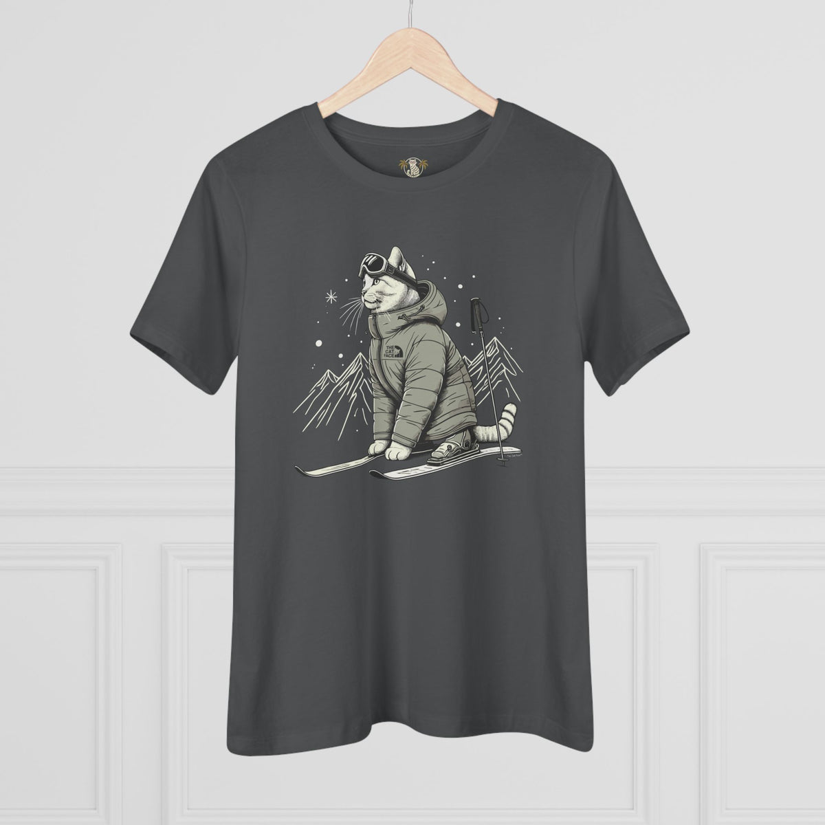 The Cat Face Alpine Explorer Graphic Women's T-Shirt in asphalt, on a hanger