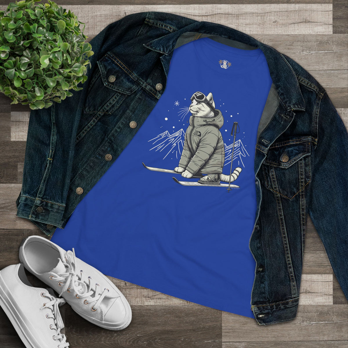 The Cat Face Alpine Explorer Graphic Women's T-Shirt in true royal, flat lay