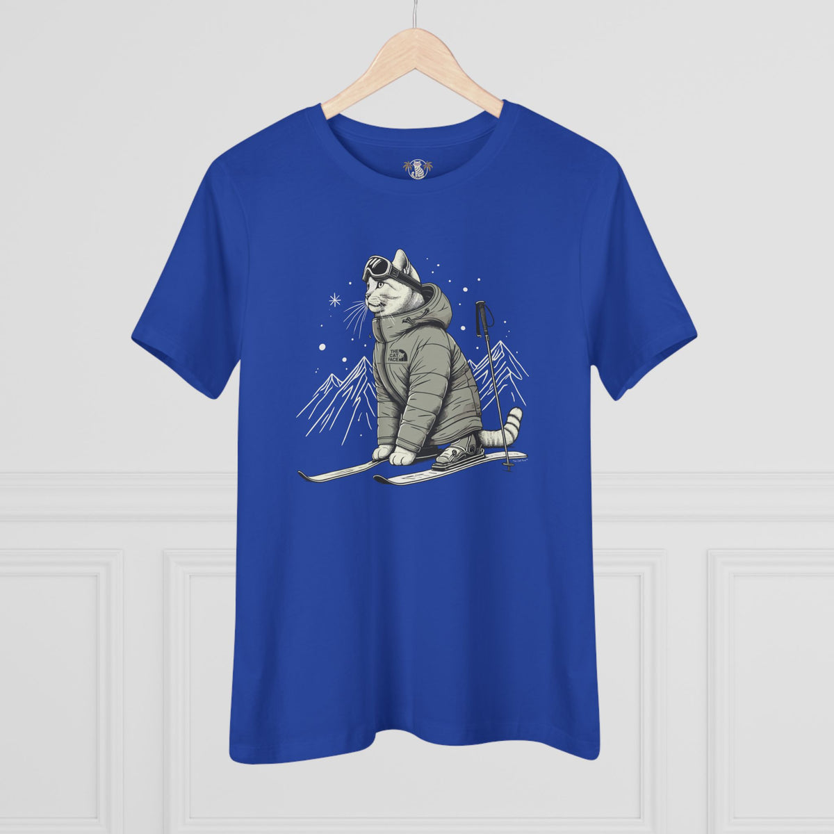 The Cat Face Alpine Explorer Graphic Women's T-Shirt in true royal, flat lay