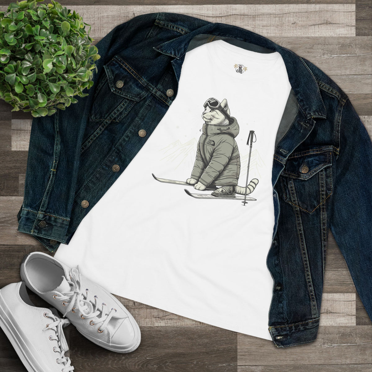 The Cat Face Alpine Explorer Graphic Women's T-Shirt in white, flat lay