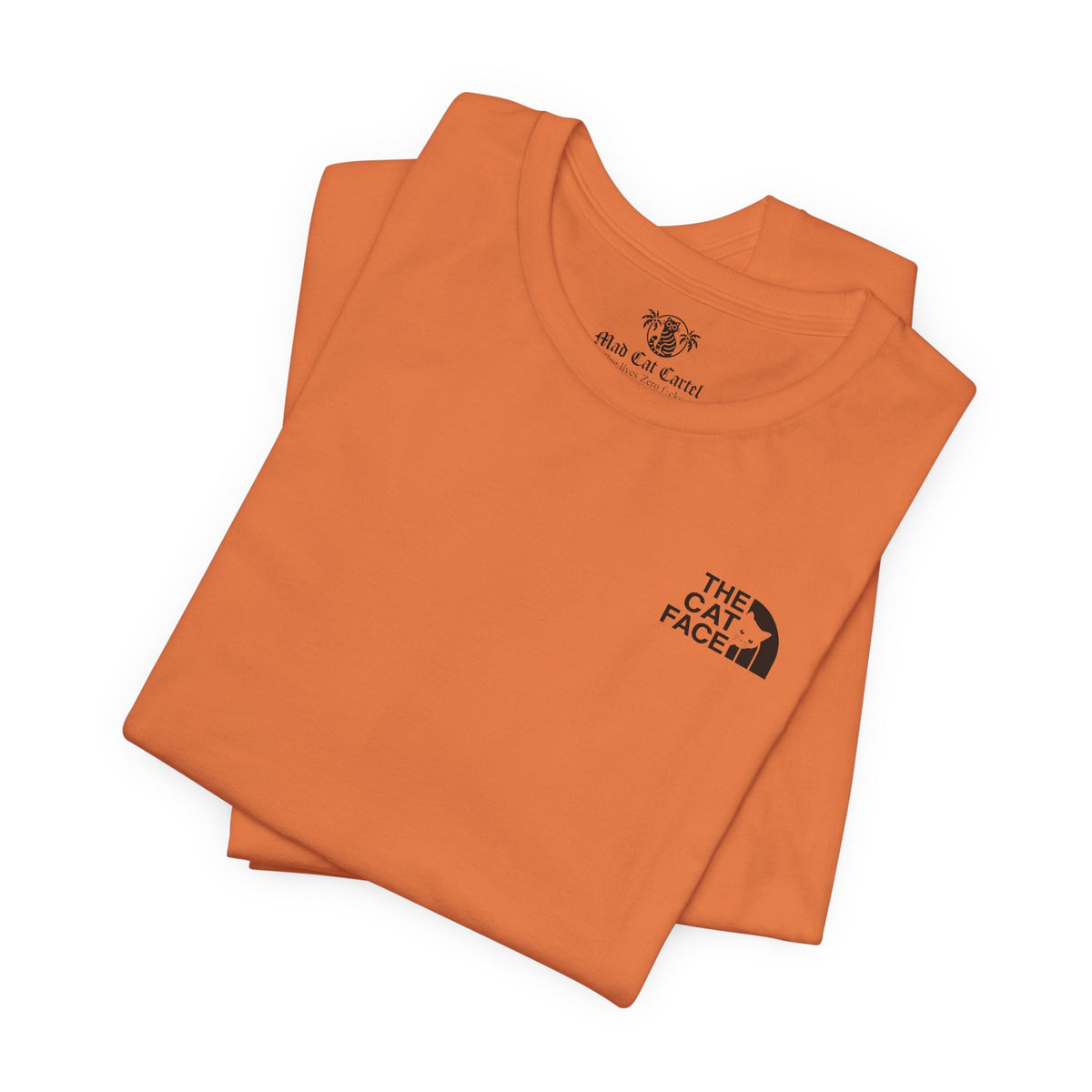The Cat Face Classic Mini Chest Logo T-Shirt in burnt orange, folded