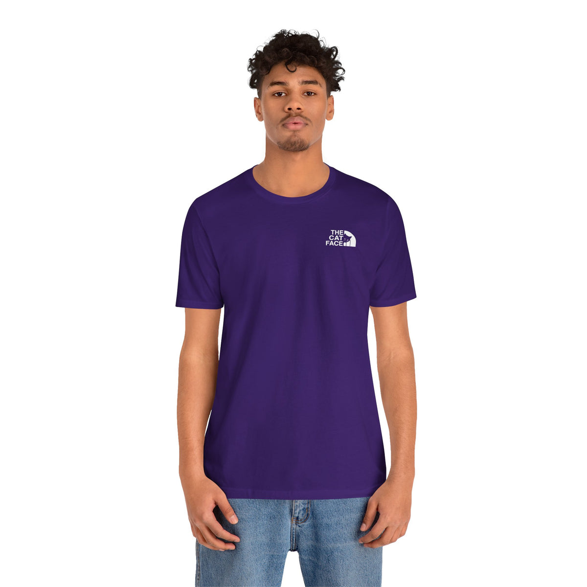 The Cat Face Classic Mini Chest Logo T-Shirt in team purple, worn by a male model