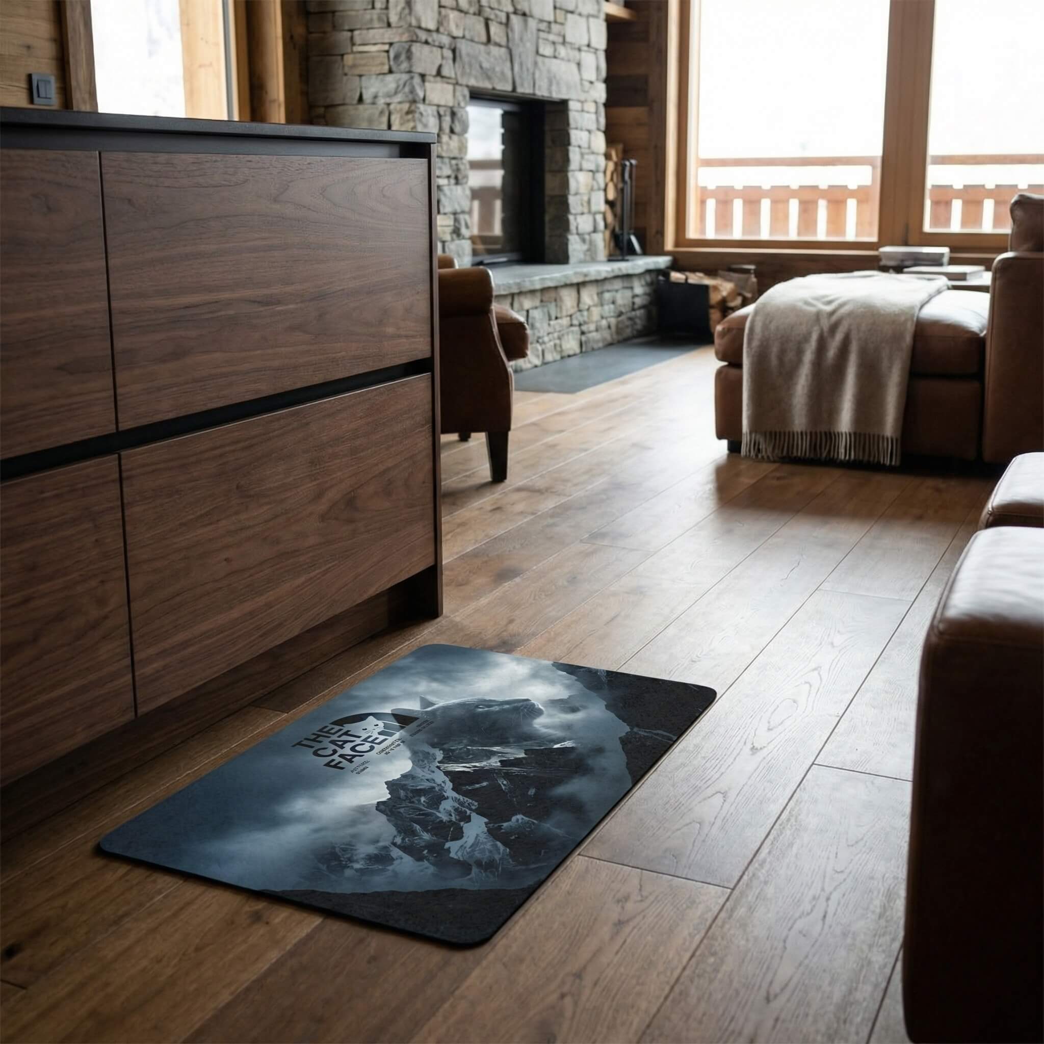 The Cat Face Expedition cat food mat in cabin interior with moody mountain graphic by Mad Cat Cartel