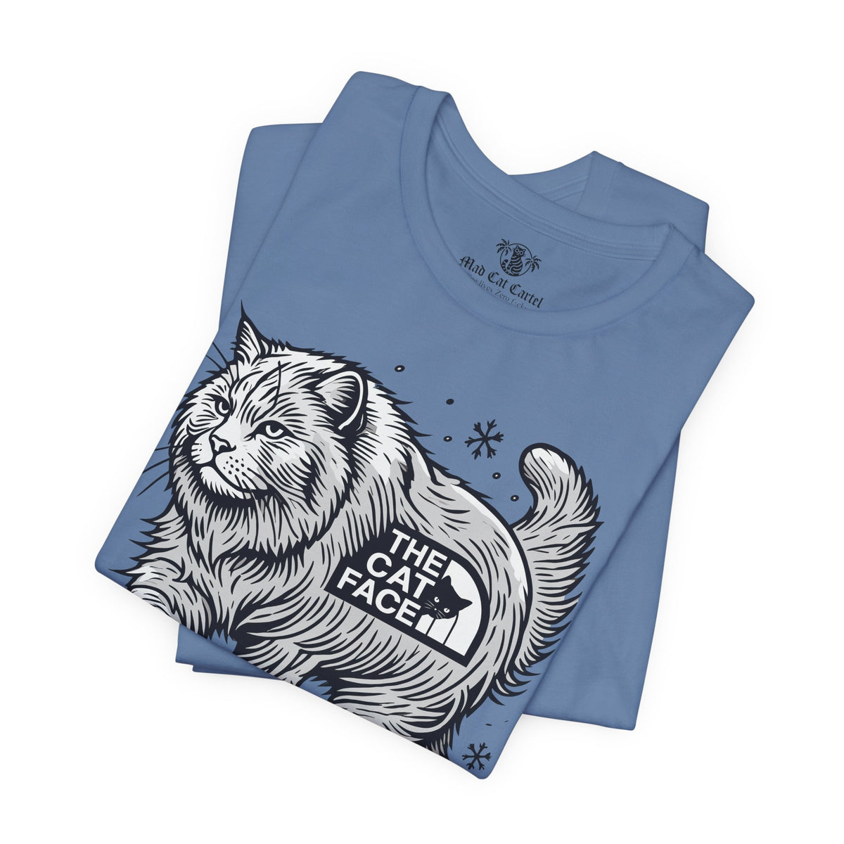 The Cat Face Snow Explorer Cat Graphic T-Shirt in lavender blue, folded