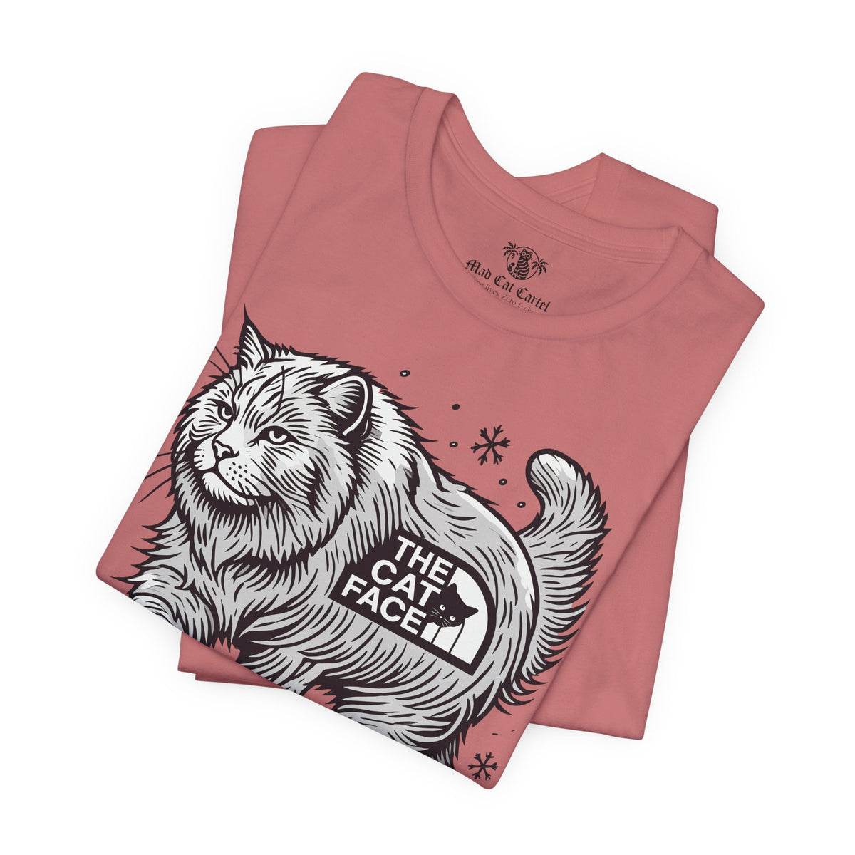 The Cat Face Snow Explorer Cat Graphic T-Shirt in mauve, folded