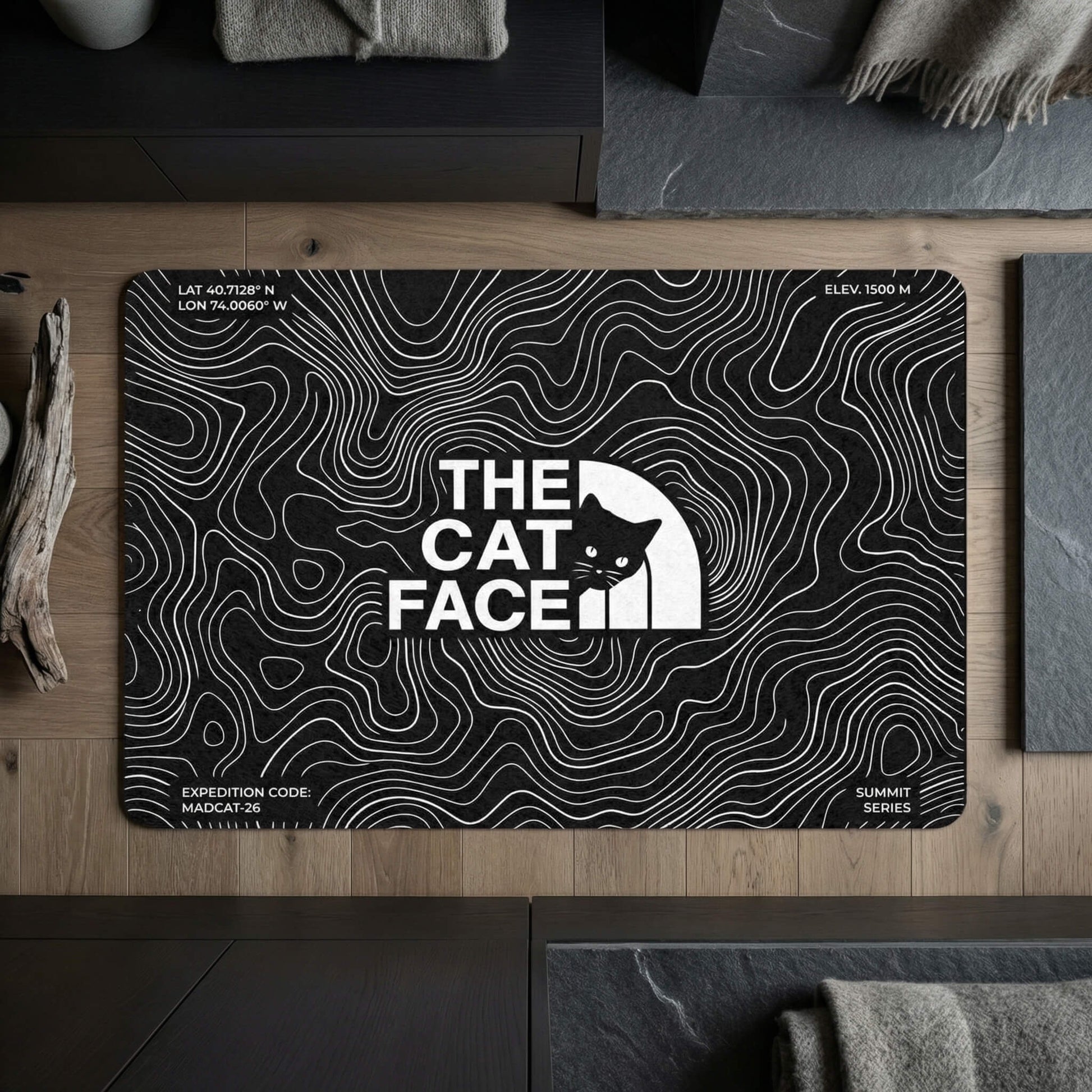 Topographic bowl placemat for cats in black with bold The Cat Face branding