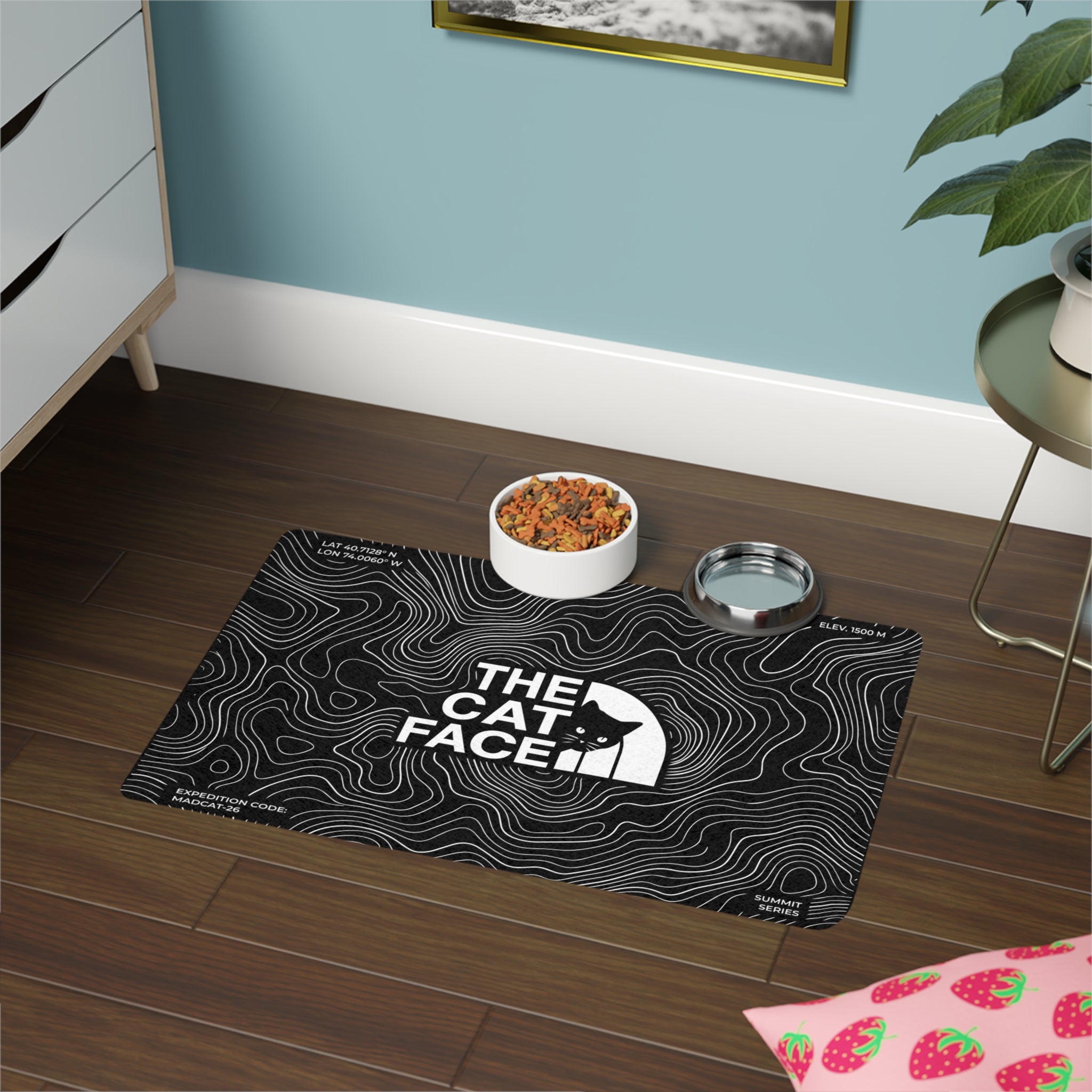 Black cat bowl mat with The Cat Face summit terrain design and food and water bowls