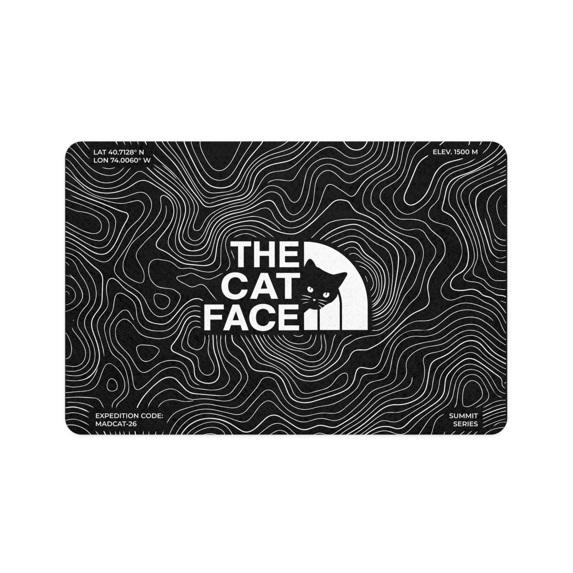 The Cat Face Summit Terrain Cat Feeding Mat Black with white topo line graphic by Mad Cat Cartel