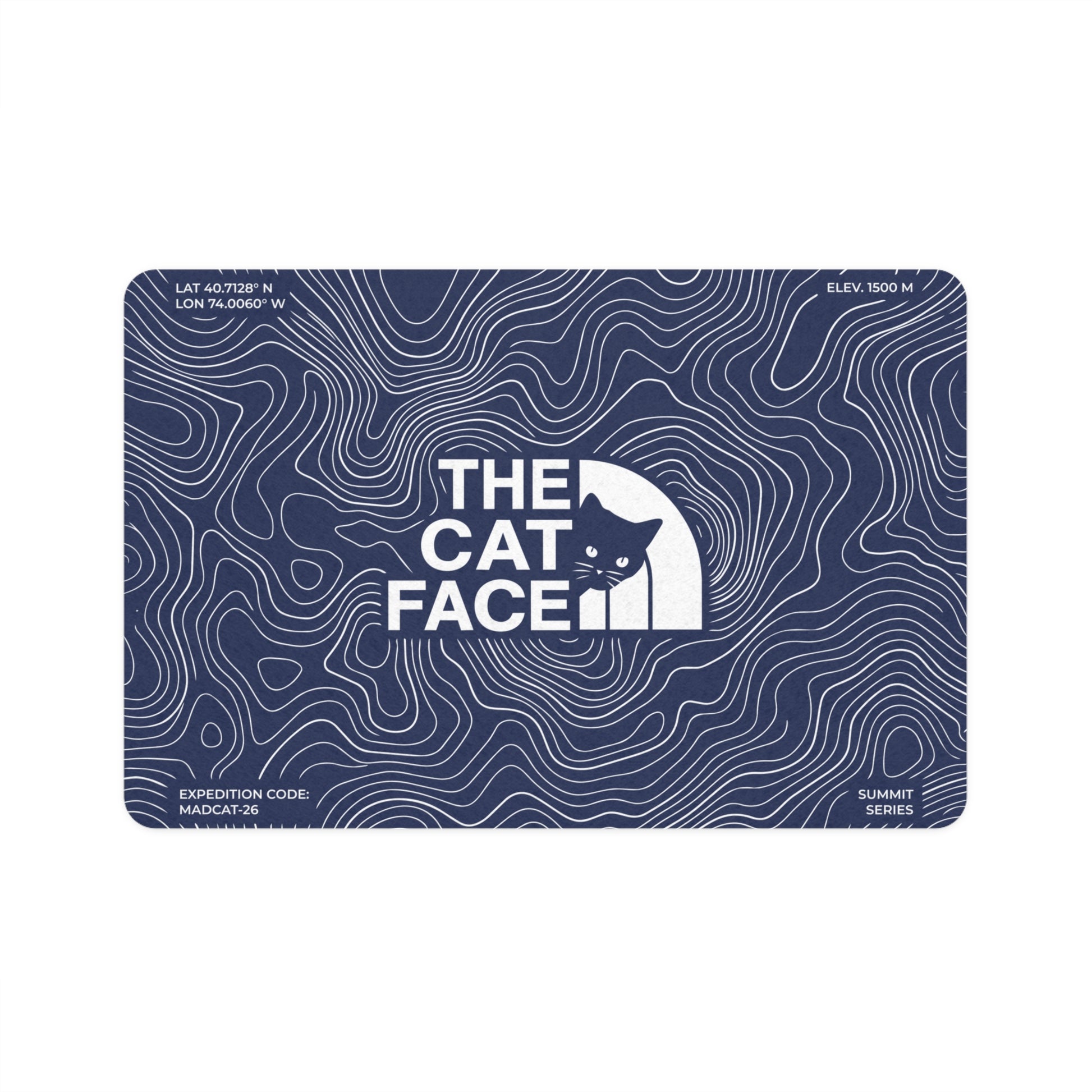 The Cat Face Summit Terrain blue cat feeding mat with white topo lines by Mad Cat Cartel