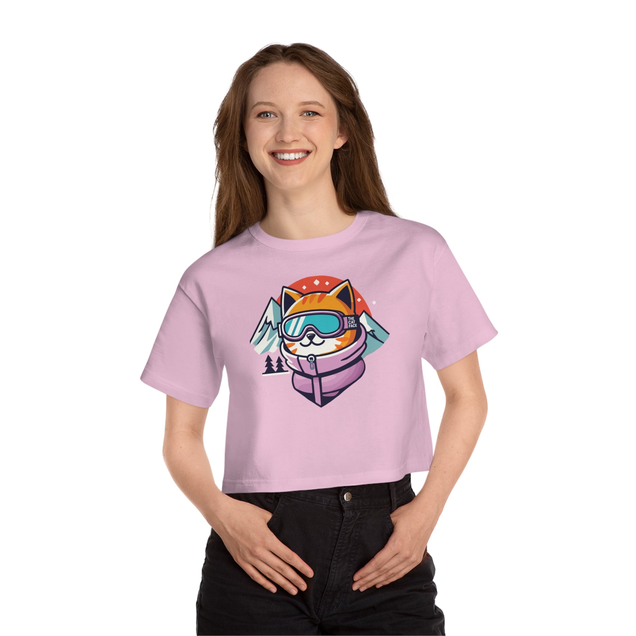 The Cat Face Slope Ready Graphic Crop Top in pink candy, worn by a female model