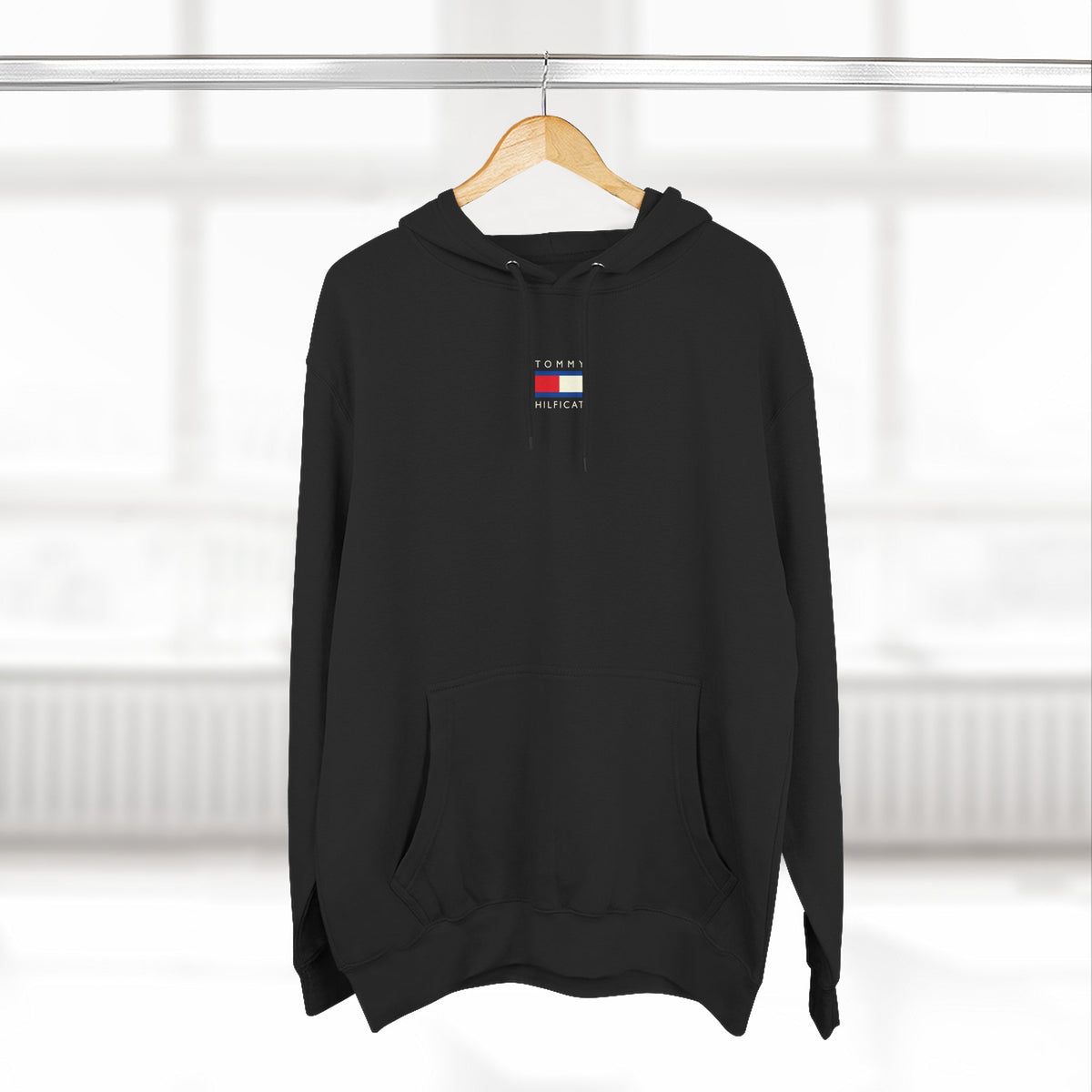 Tommy Hilficat Chest Logo Colorwave Cat Graphic Hoodie in black, on a hanger