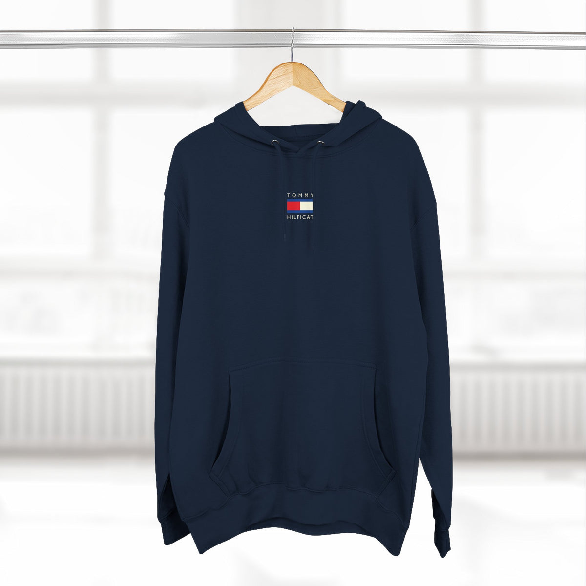 Tommy Hilficat Chest Logo Colorwave Cat Graphic Hoodie in navy, on a hanger
