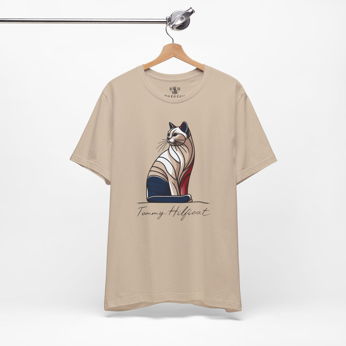 Tommy Hilficat Regal Outline Cat Graphic T-Shirt in tan, on a hanger