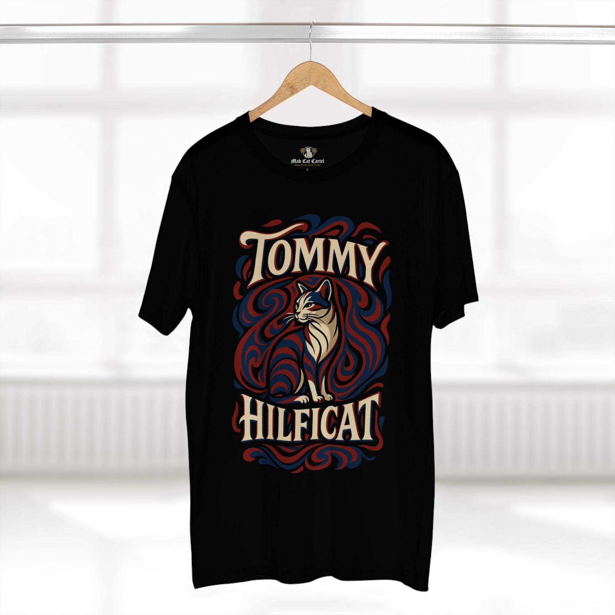 Tommy Hilficat Swirl Statement Cat Graphic T-Shirt in black, on a hanger