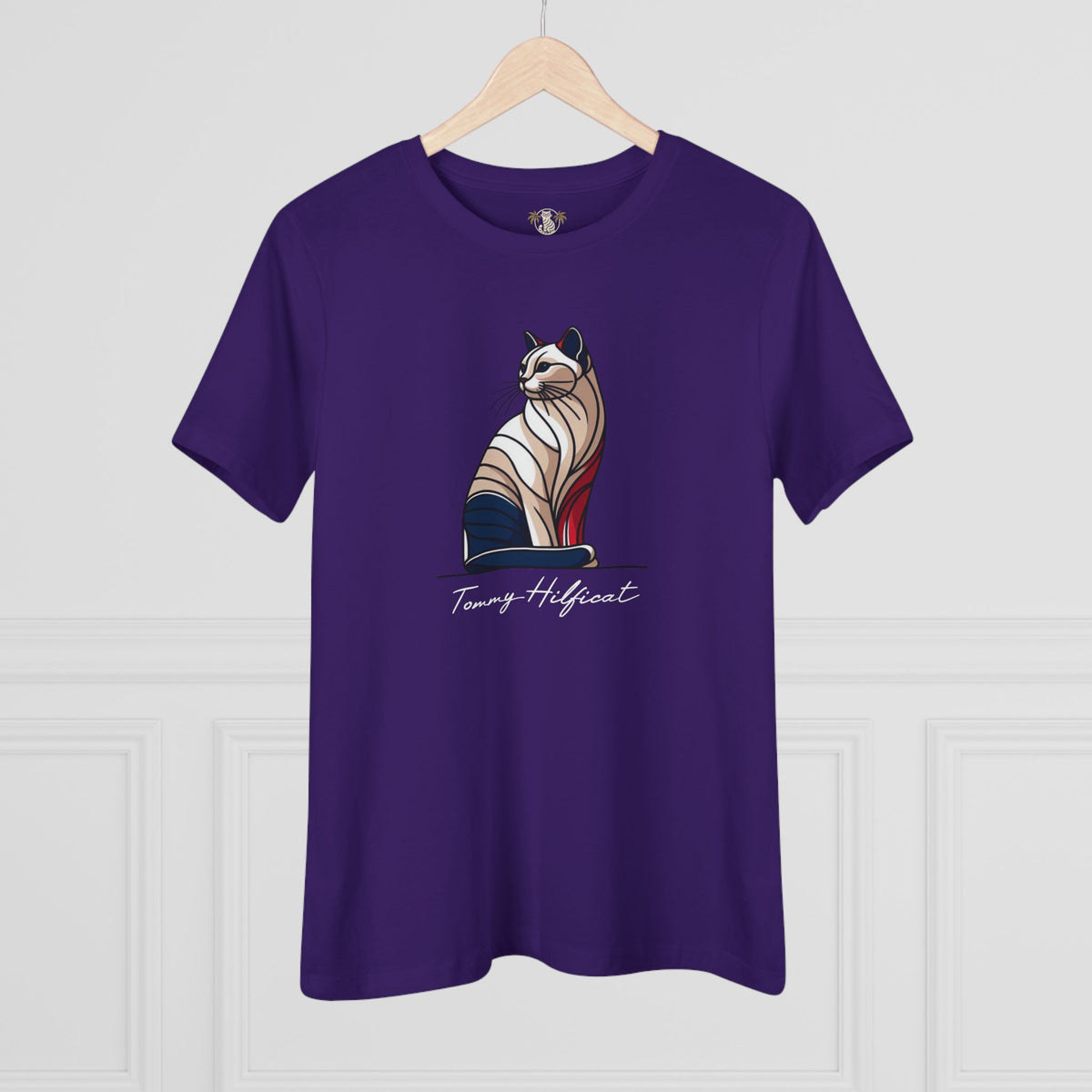 Tommy Hilficat The Sitting Icon Women's T-Shirt in team purple, on a hanger