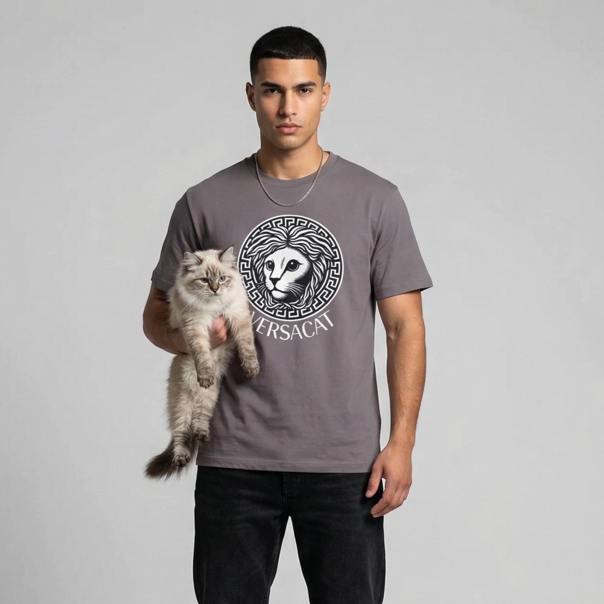 Versacat designer parody cat tee by Mad Cat Cartel in storm gray worn by male model holding fluffy cat with front logo print