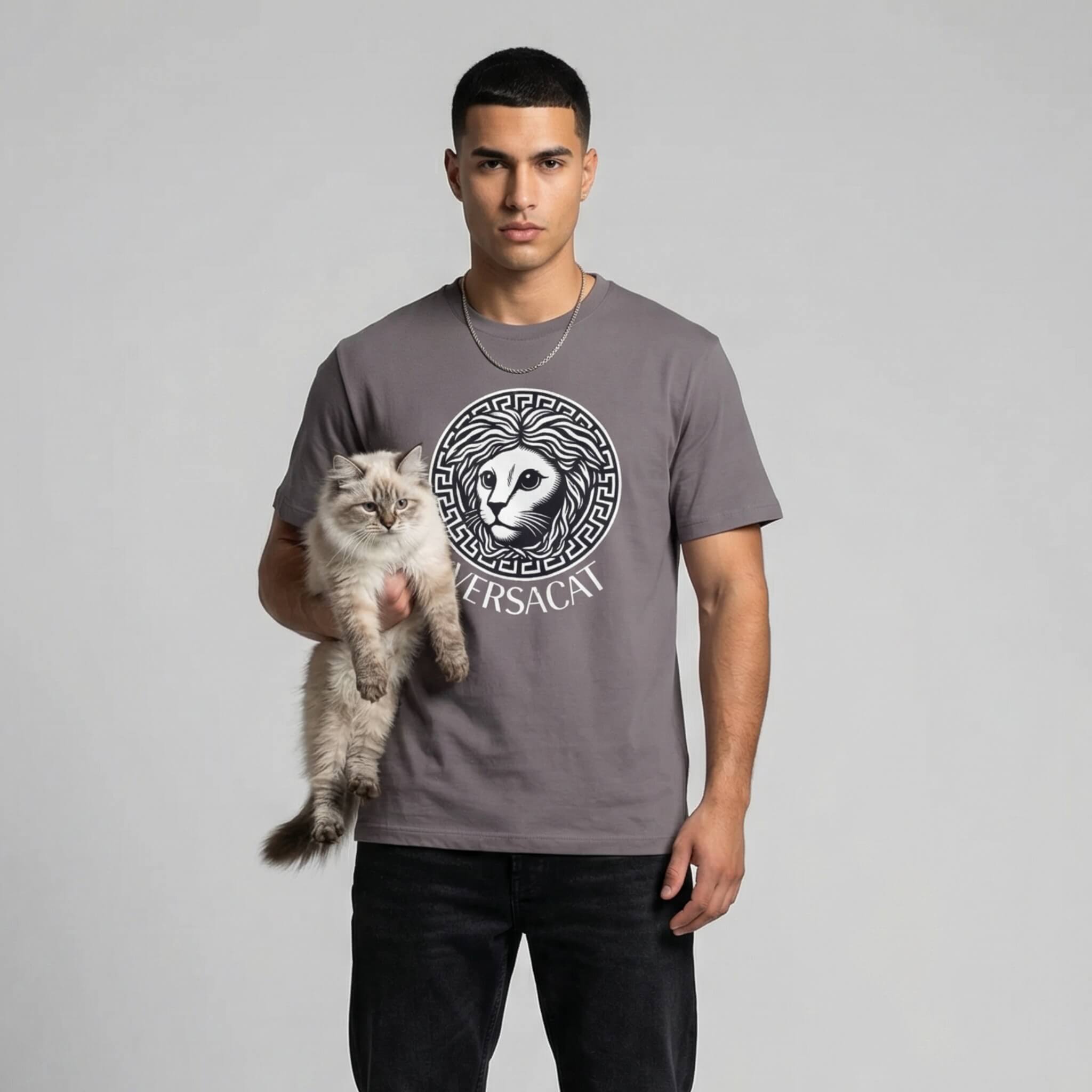 Versacat designer parody cat tee by Mad Cat Cartel in storm gray worn by male model holding fluffy cat with front logo print