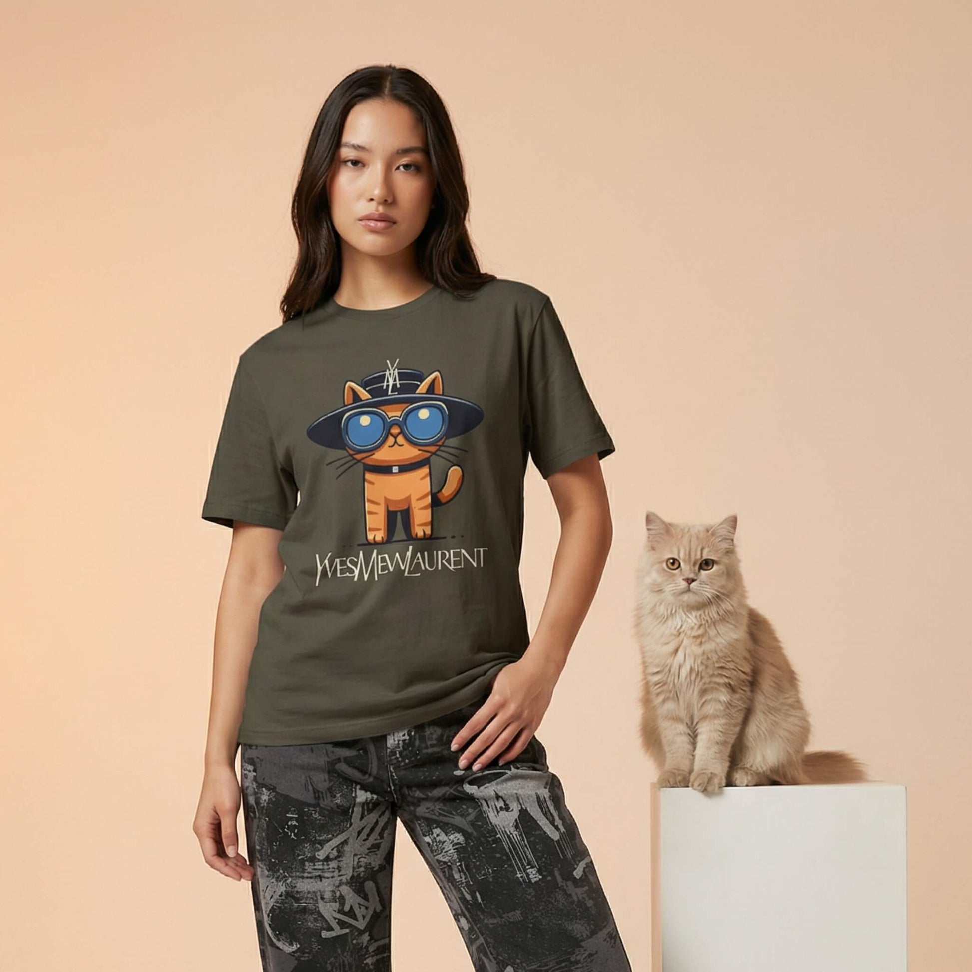 Yves Mew Laurent cat graphic t shirt by Mad Cat Cartel in army green worn by female model with beige cat